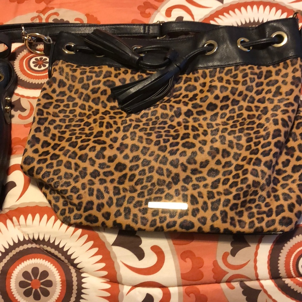 Purses. 5pocket 2little rips